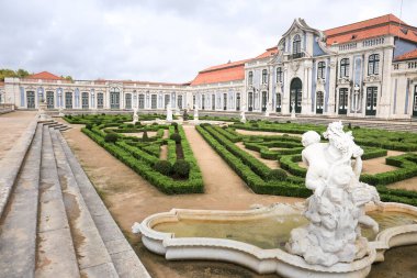 Lisbon, Portugal- November 28, 2022:Topiary art garden in the Garden of Queluz Palace in winter