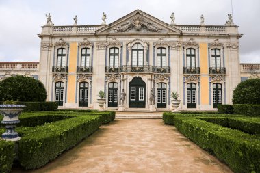 Lisbon, Portugal- November 28, 2022:Topiary art garden in the Garden of Queluz Palace in winter