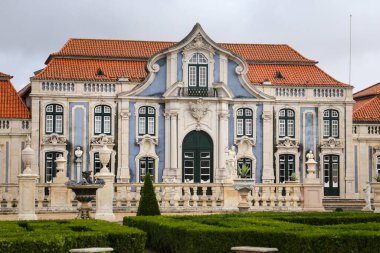 Lisbon, Portugal- November 28, 2022:Topiary art garden in the Garden of Queluz Palace in winter