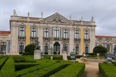 Lisbon, Portugal- November 28, 2022:Topiary art garden in the Garden of Queluz Palace in winter