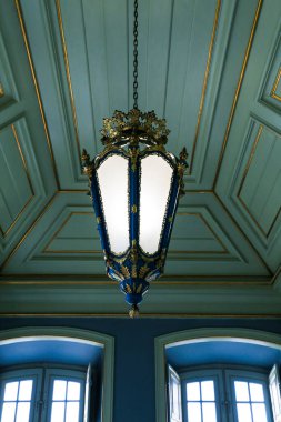 Queluz, Lisbon, Portugal- January 17, 2023: Ceiling art, furniture and wall decoration of the Beautiful National Palace of Queluz, Sintra