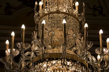 Queluz, Lisbon, Portugal- November 22, 2022: Crystal Chandelier lamp hanging in the National Palace of Queluz