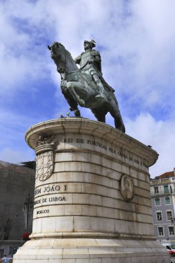 Lisbon, Portugal- October 21, 2022: Bronze equestrian statue of King Joao I at Figueira Square