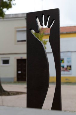 Lisbon, Portugal- October 21, 2022: Iron Sculpture in the bandstand square of Carnide neighborhood in Lisbon