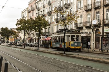 Lisbon, Portugal- November 6, 2022:Vintage tram through the streets in Lisbon