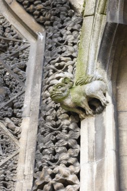 Bristol, England- March 29, 2024: Medieval Carved Stone details at the entrance of St. Mary Redcliffe church clipart