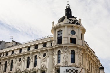 Madrid, Spain- April 8, 2023: Beautiful Calderon Theater building in Atocha street, Madrid clipart