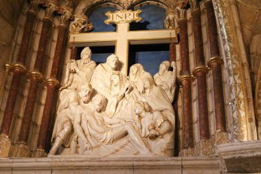 Avila, Castilla y Leon, Spain- August 18, 2024: Beautiful Alabaster images of The Sacristy or San Bernabe Chapel of the Cathedral of Avila clipart