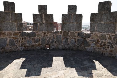 Architectural details of The majestic walls and views of Avila city clipart