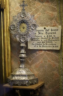 Avila, Castilla y Leon, Spain- August 17, 2024: Relic of the arm of Santa Teresa in The Monastery of La Encarnacion in Avila city clipart