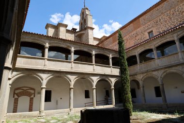 Avila, Castilla y Leon, Spain- August 18, 2024: Cloister of Novices in The Royal Monastery of St. Thomas in Avila city clipart