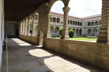 Avila, Castilla y Leon, Spain- August 18, 2024: Cloister of The Monarchs in The Royal Monastery of St. Thomas in Avila city clipart