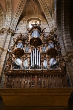 Avila, Castilla y Leon, Spain- August 18, 2024: Beautiful pipe organ in Saint Vincent church in Avila city clipart