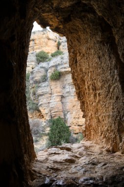 Roman Aqueduct excavated in rock in Sierra de Albarracin, Teruel, Spain clipart