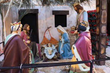 Elche, Alicante, Spain- December 23, 2024: Nativity Scene Figures in the town hall of Elche city at Christmas season clipart