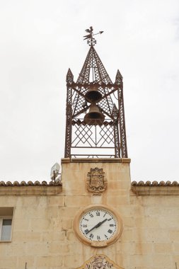Novelda, Alicante, Spain- September 18, 2025: Beautiful Novelda city Town Hall facade under cloudy sky