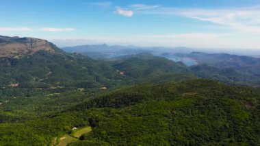 Aerial drone of Mountains with rainforest and jungle in the mountainous province of Sri Lanka. Riverston, Sri Lanka.