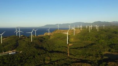 Wind Farm with wind turbines on the seashore. Wind power plant. Philippines.