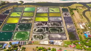Aerial view of Pump ponds at a shrimp farm in the Philippines.Prawn farm with aerator pump.