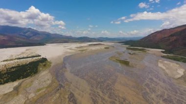 Top view of shallow river bed in a mountain valley. Bucao river. Luzon, Philippines.