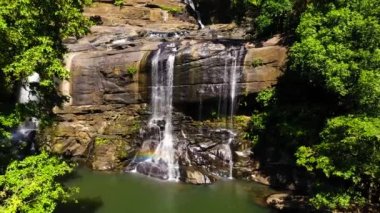 Waterfall in the green forest. Sera ella Falls in the jungle. Sri Lanka.