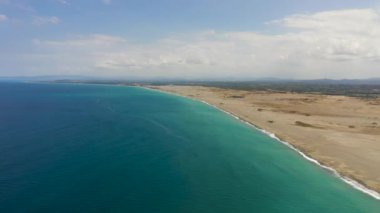 Aerial view of tropical sandy beach. Paoay Sand Dunes, Ilocos Norte, Philippines.