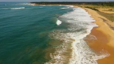 Spot for surfers with sandy beach and ocean. Whiskey point, Sri Lanka.