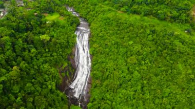 Aerial view of Tropical Kirindi Falls in mountain jungle. Sri Lanka.