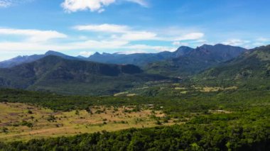 Aerial drone of Mountains and green hills. Riverston, Sri Lanka. Slopes of mountains with evergreen vegetation.