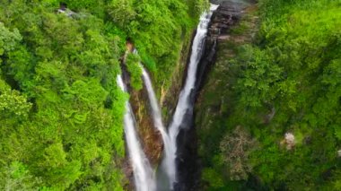 Waterfall in the green forest. Puna Ella Falls in the jungle. Sri Lanka.