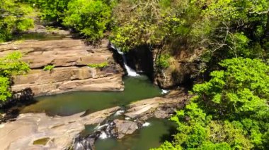 Waterfall in a tropical forest. Aerial view of Sera ella Falls. Sri Lanka.