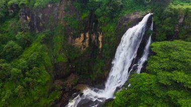 Tropical Devon Falls in mountain jungle. Waterfall in the tropical forest.