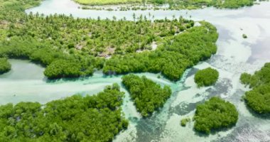 Blue lagoon with islands in turquoise water. Tropical landscape. Balidbid Lagoon, Bantayan island, Philippines.