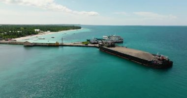 Top view of sea port and ships on a tropical island. Bantayan island, Philippines.