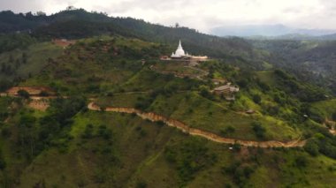 Mahamevnawa Buddhist Monastery temple in the mountain top. Bandarawela, Sri Lanka.