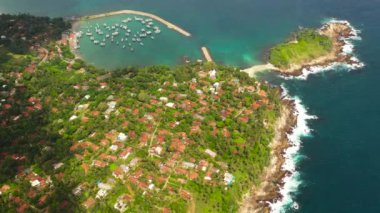 Aerial view of bay and the coast with hotels in Sri Lanka.