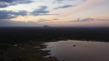 Lake in the rainforest during sunset. Panama Wewa lake in Sri Lanka. Arugam bay.