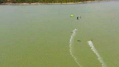 Kalpitiya, Sri Lanka - 9th November 2021 : Top view of Kitesurfers in the water. Kitesurfing at Kalpitiya Beach.