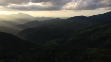 Tropical landscape with mountains and jungle during sunset. Sri Lanka.