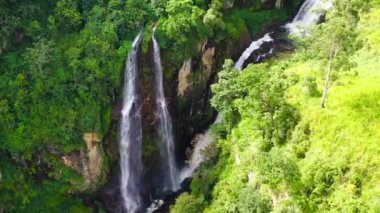 A beautiful waterfall among the rainforest and vegetation. Sri Lanka.Puna Ella Falls.