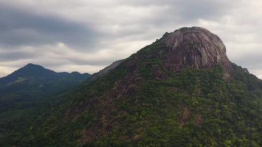 Aerial drone of Tropical mountain range and mountain slopes with rainforest. Sri Lanka.