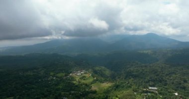 Mountains with rainforest and clouds. Negros, Philippines