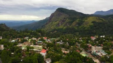 Aerial drone of Ella town among mountains and tea plantations. Sri Lanka.