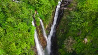 Aerial drone of Puna Ella Falls in a mountain gorge Waterfall in the tropical forest. Sri Lanka.