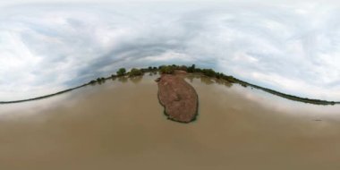 Crocodile basking in the sun on a rock in the lake. Sri Lanka. Panama Wewa, Arugam bay. 360VR.