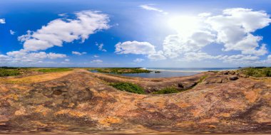 The view from the Crocodile Rock to the ocean and lake and savannah. Sri Lanka sites of wetlands. Virtual Reality 360.