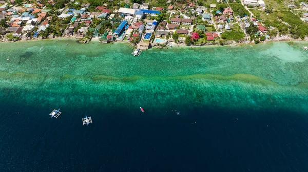 Shore of Moalboal with hotels and dive centers. A popular place for divers. Philippines, Cebu.