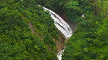 Top view of Beautiful waterfall in green forest. Diyagalla Ella Falls in Sri Lanka.