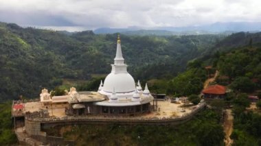 Mahamevnawa Buddhist Monastery among mountains and hills. temple in the mountain top. Bandarawela, Sri Lanka.