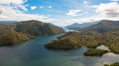 Aerial view of Lake and mountains on the background of clouds. Sri Lanka.